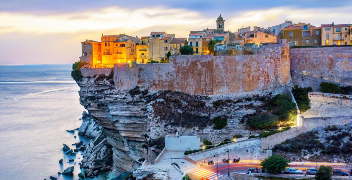 Entering Bonifacio’s cliffside harbor by yacht on a Corsica charter