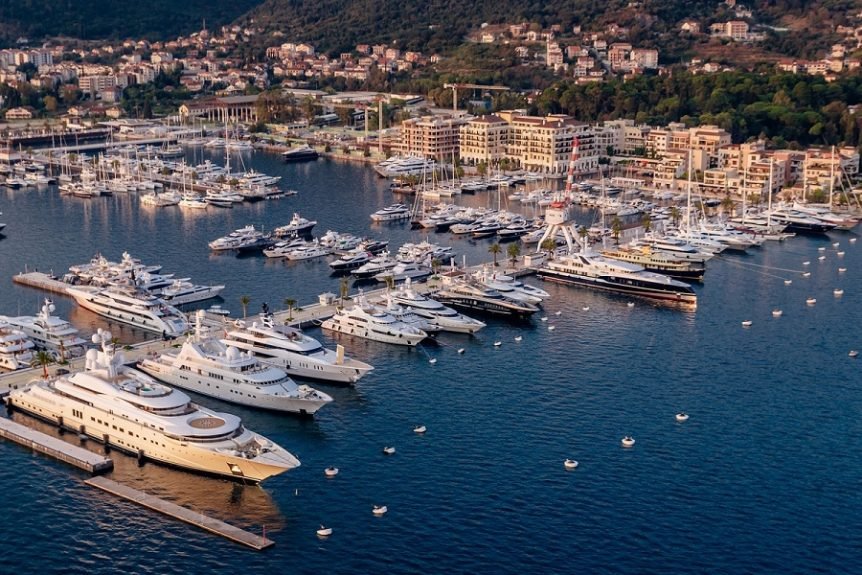 Superyacht docked at Porto Montenegro marina during charter